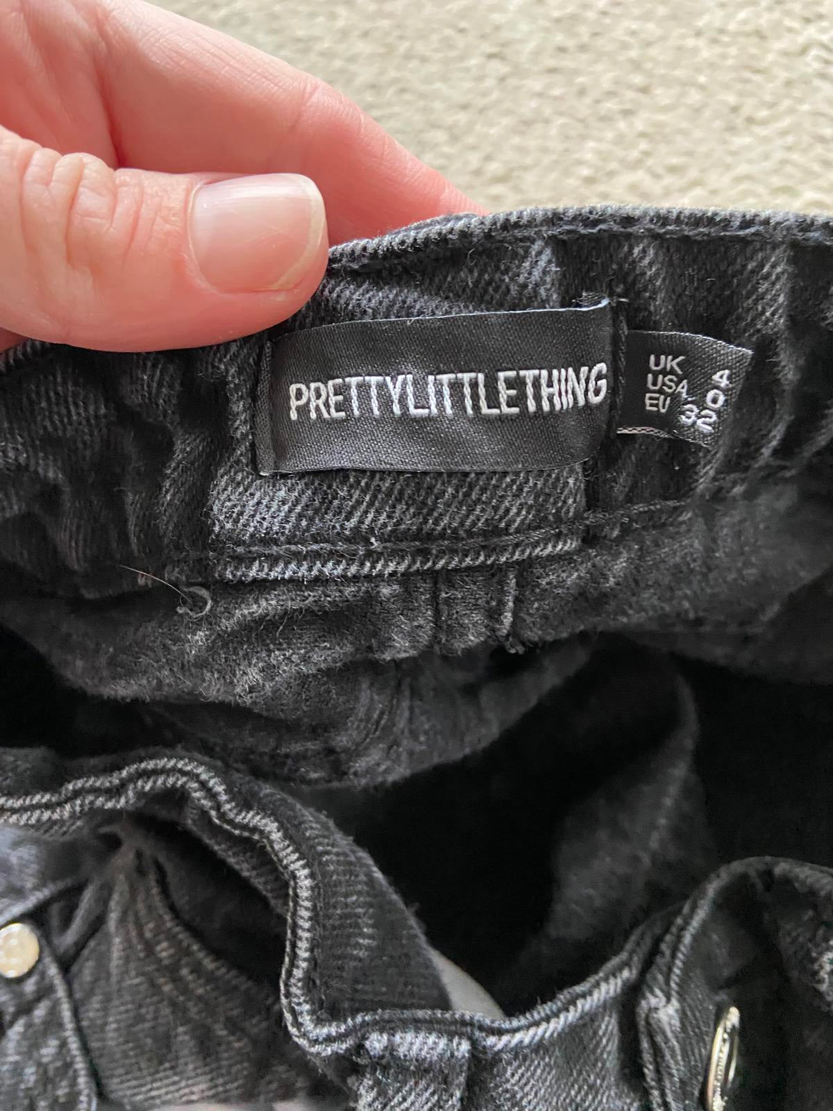 PrettyLittleThing (PLT) Black Distressed Denim Mini Skirt - Size UK 4